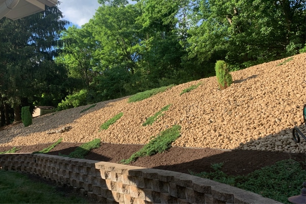 rocks and boulders on retaining wall